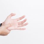 Woman hand pain on white background,Health and illness concepts,Peripheral neuropathies